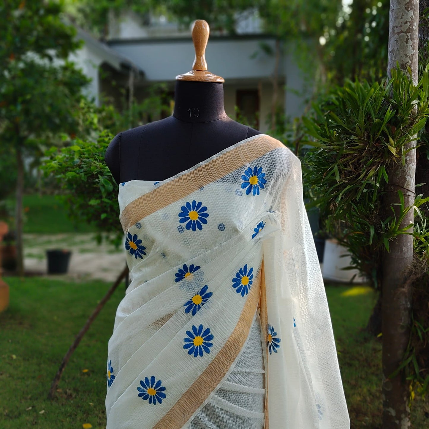 Graceful Hand-Painted Floral Saree On Airy Kota Doria Weave