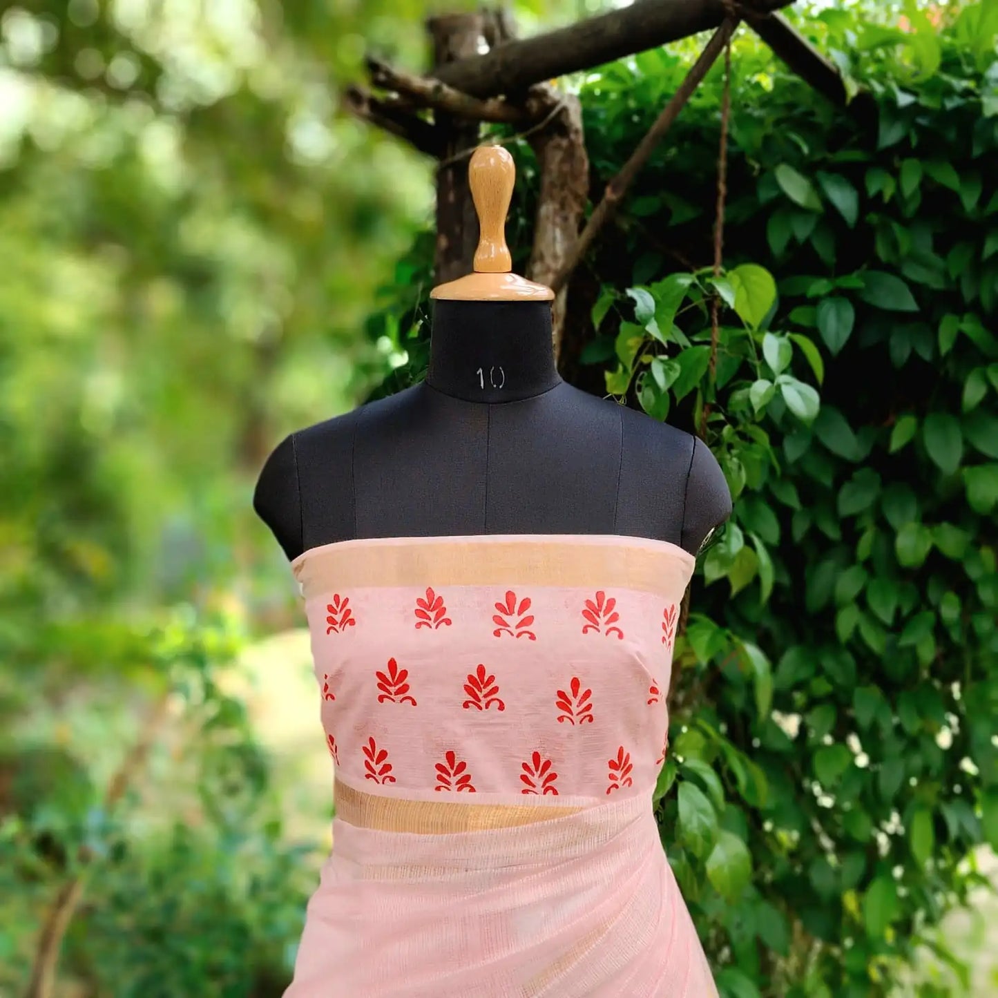 Graceful Alpona motifs Hand-Painted On Soft Kota Doria Saree