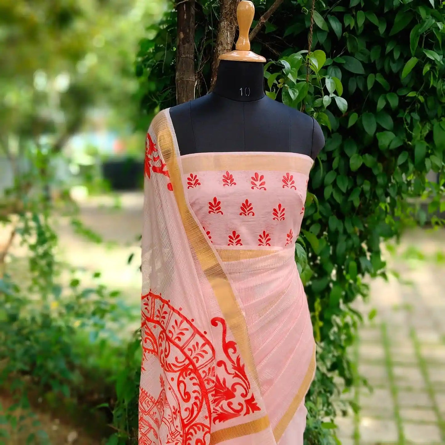 Graceful Alpona motifs Hand-Painted On Soft Kota Doria Saree