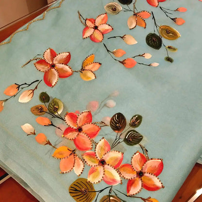 Dreamy Blue Silk Organza Saree With Plumeria Blossoms Painted For A Timeless Look