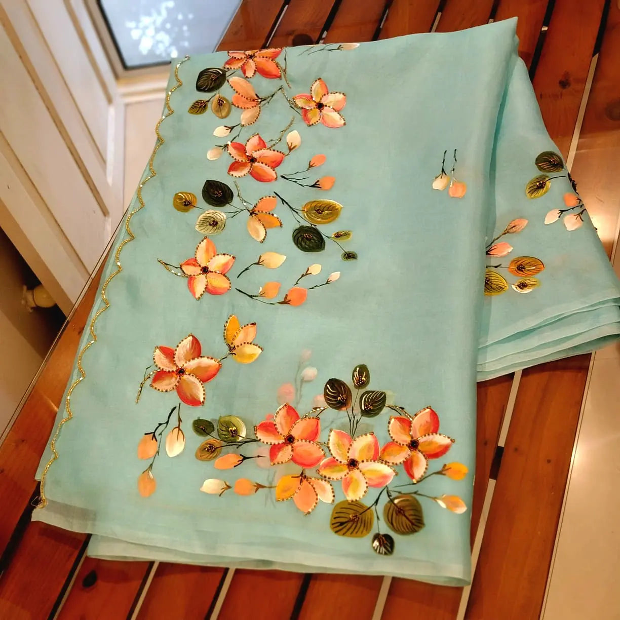 Dreamy Blue Silk Organza Saree With Plumeria Blossoms Painted For A Timeless Look