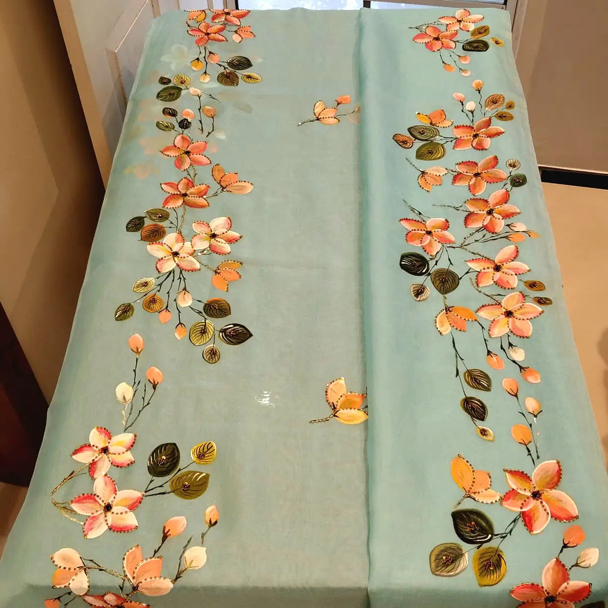 Dreamy Blue Silk Organza Saree With Plumeria Blossoms Painted For A Timeless Look