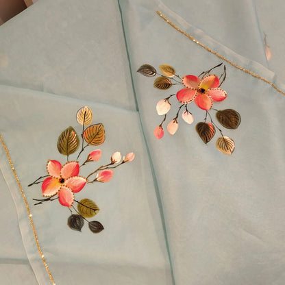 Dreamy Blue Silk Organza Saree With Plumeria Blossoms Painted For A Timeless Look