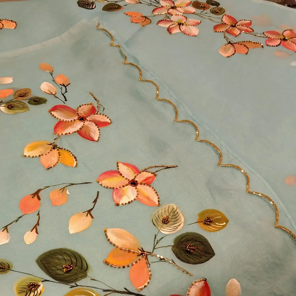 Dreamy Blue Silk Organza Saree With Plumeria Blossoms Painted For A Timeless Look