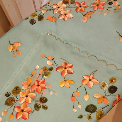 Dreamy Blue Silk Organza Saree With Plumeria Blossoms Painted For A Timeless Look