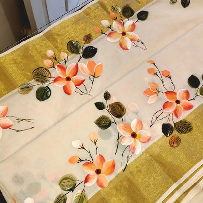 Graceful Kerala Saree With Hand-Painted Plumerias