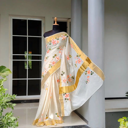 Graceful Kerala Saree With Hand-Painted Plumerias
