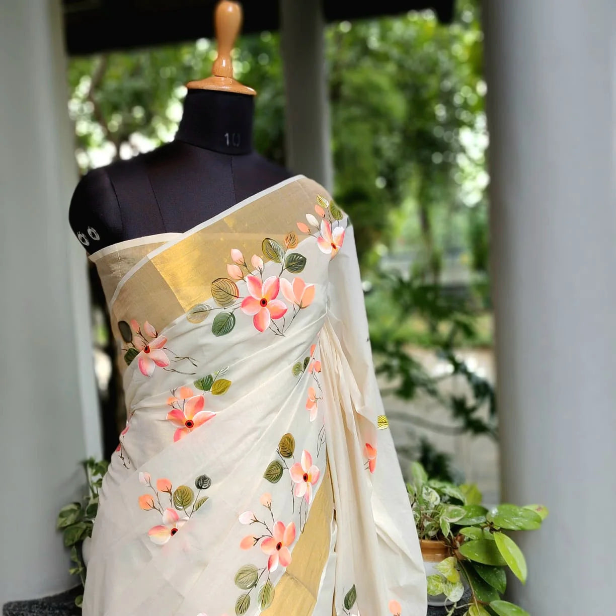 Graceful Kerala Saree With Hand-Painted Plumerias
