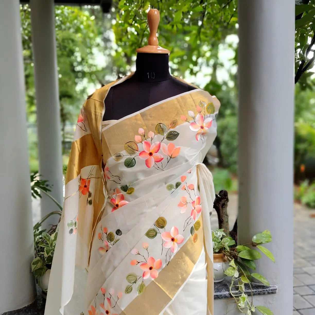 Graceful Kerala Saree With Hand-Painted Plumerias