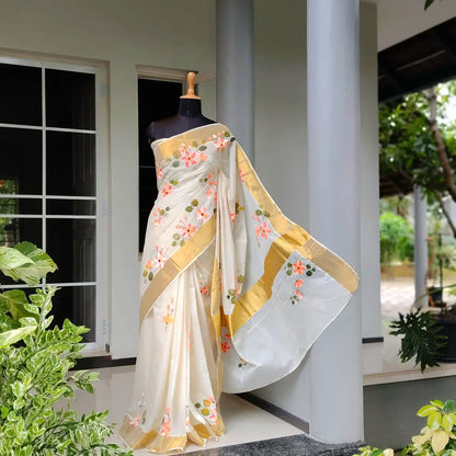 Graceful Kerala Saree With Hand-Painted Plumerias