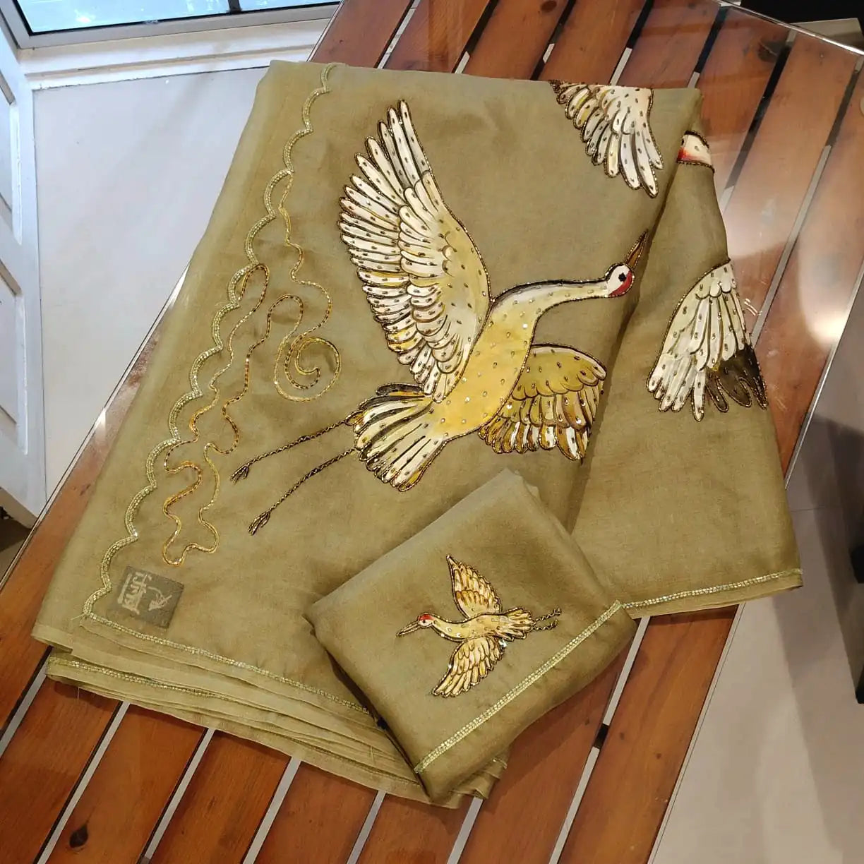 Artful Beauty On Sheer Organza Silk Saree