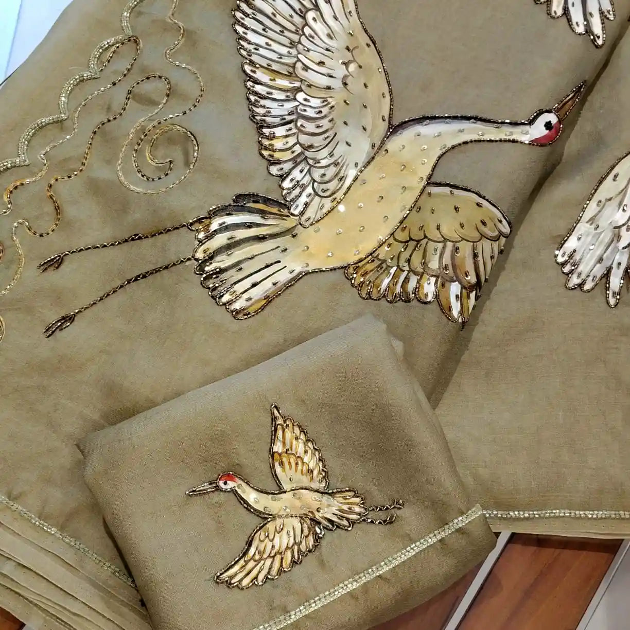 Artful Beauty On Sheer Organza Silk Saree