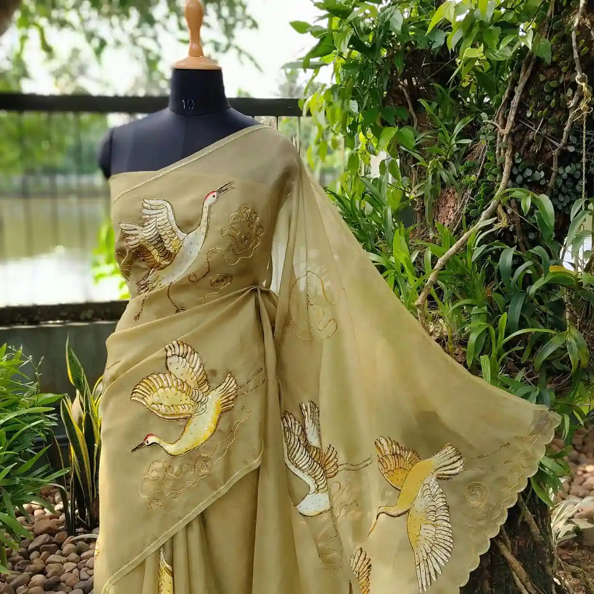 Artful Beauty On Sheer Organza Silk Saree