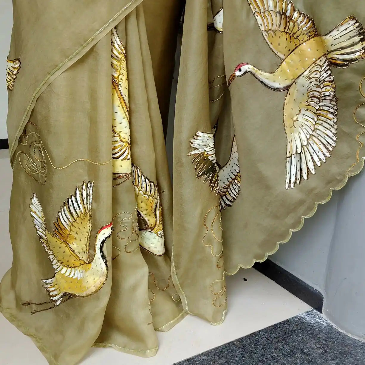 Artful Beauty On Sheer Organza Silk Saree