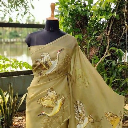 Artful Beauty On Sheer Organza Silk Saree