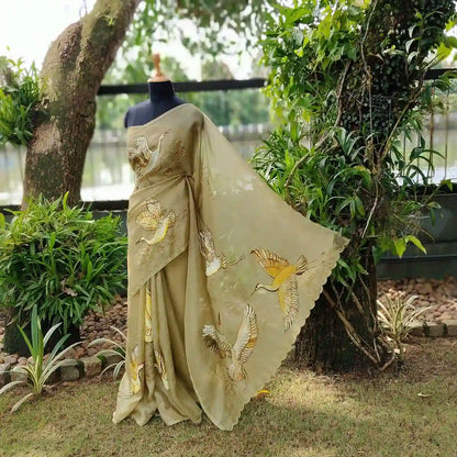 Artful Beauty On Sheer Organza Silk Saree