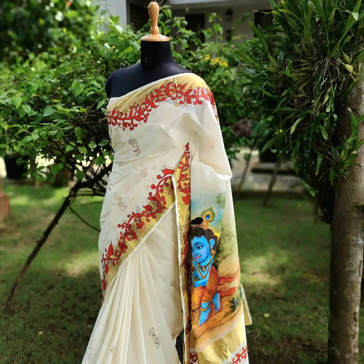 Graceful Kasavu drape with Baby Krishna Painting