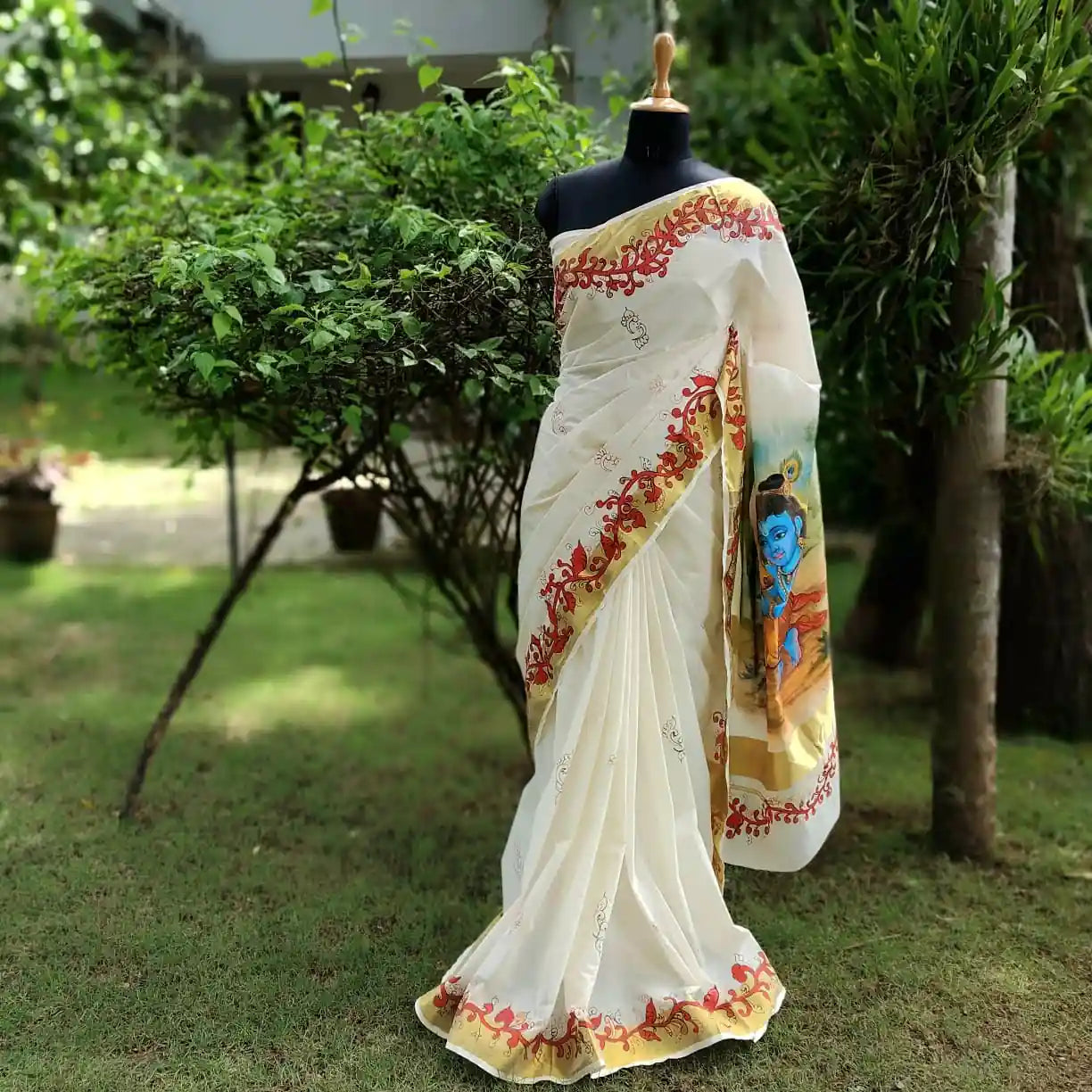 Graceful Kasavu drape with Baby Krishna Painting