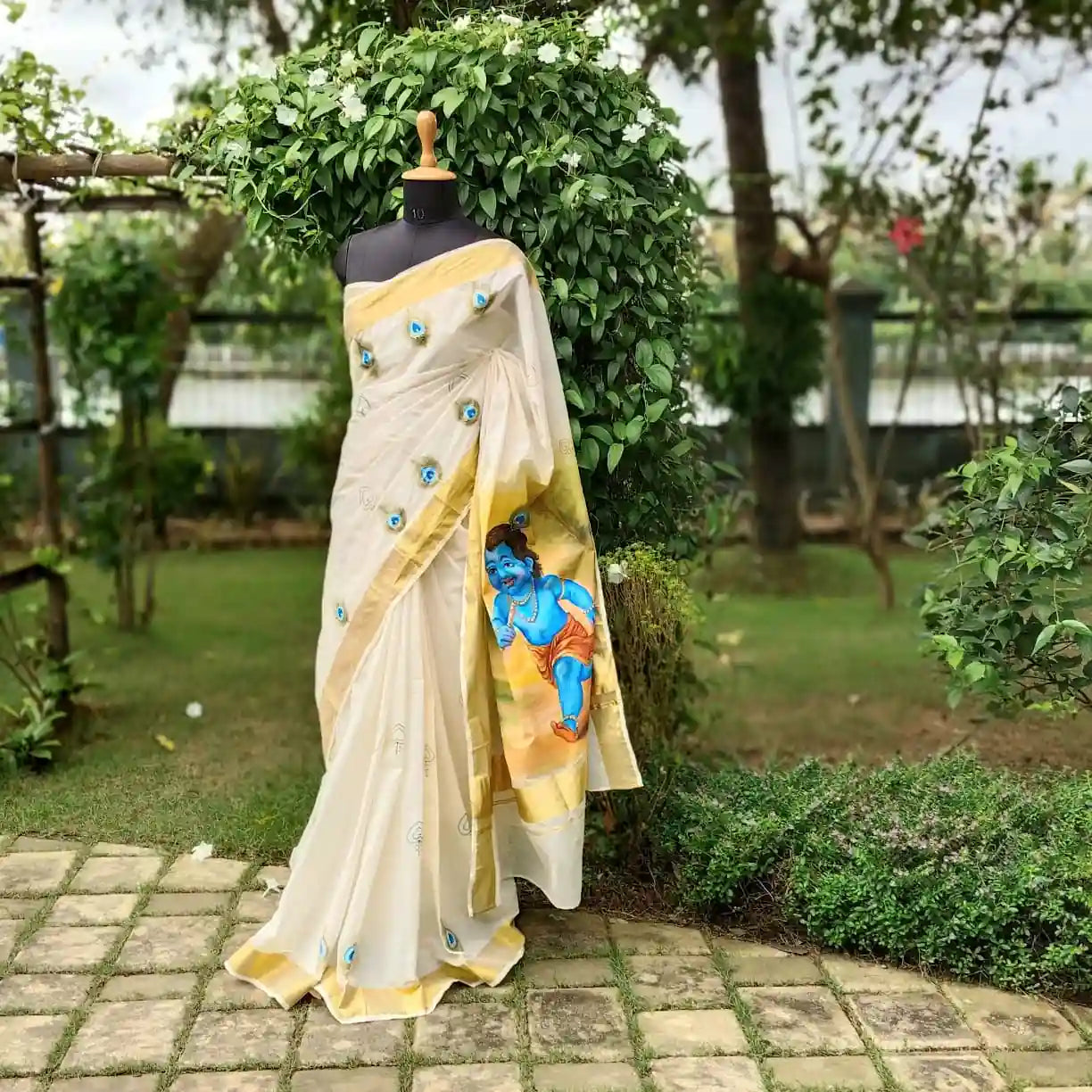 Hand-Painted Kerala Kasavu Saree Celebrating Baby Krishna