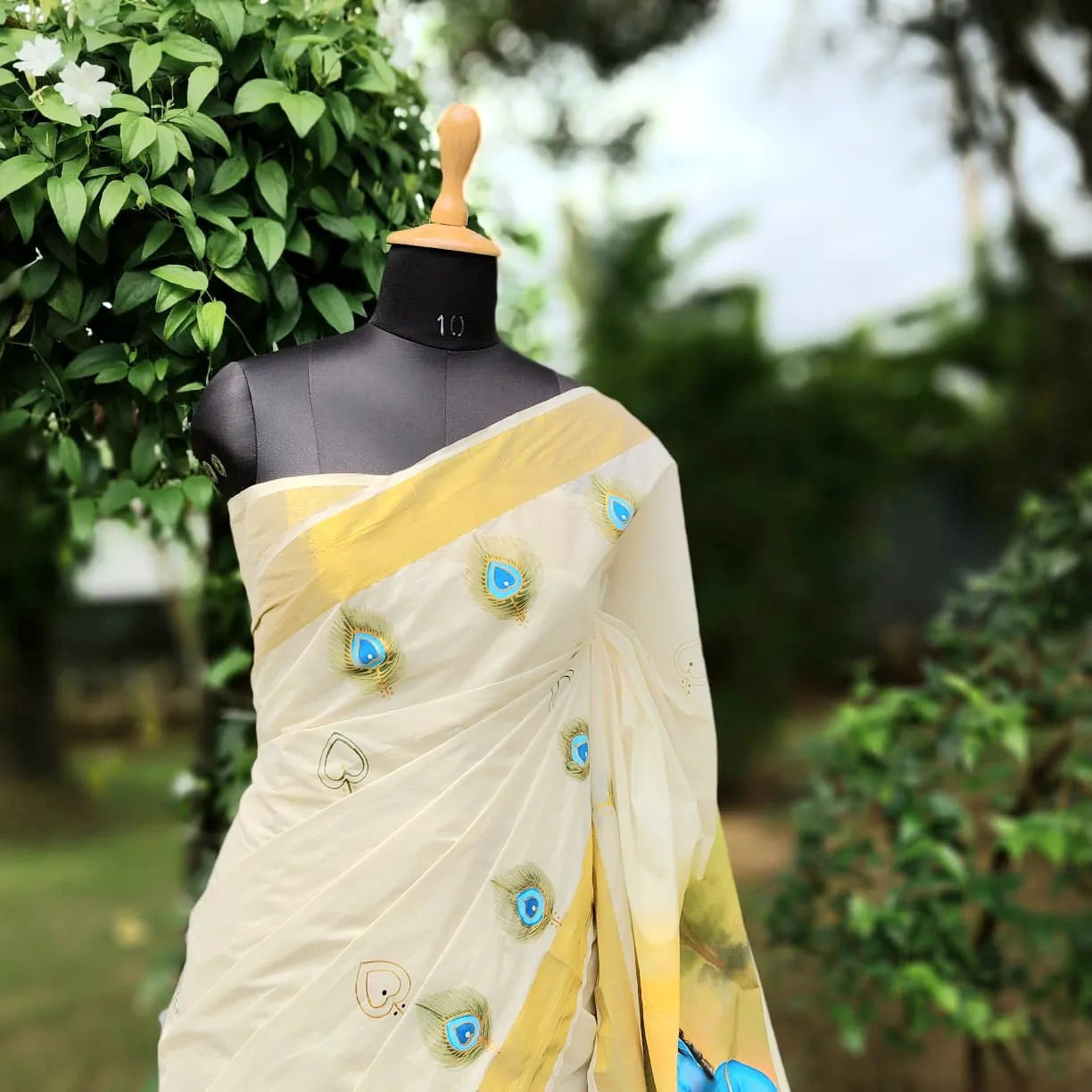 Hand-Painted Kerala Kasavu Saree Celebrating Baby Krishna