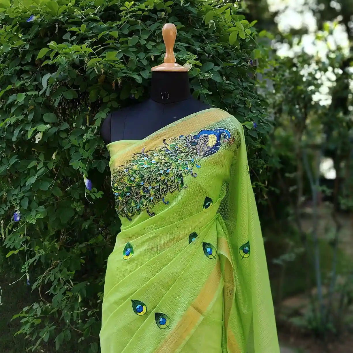 Graceful Hand-Painted Peacock Motif On soft Kota Doria Saree