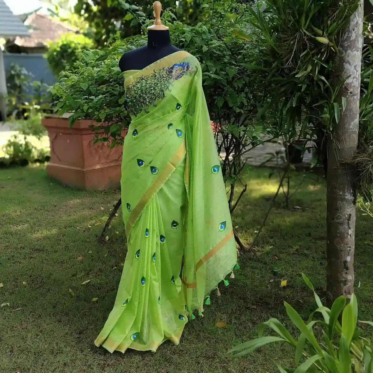 Graceful Hand-Painted Peacock Motif On soft Kota Doria Saree