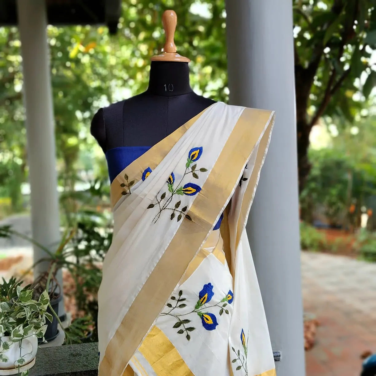 Kerala Set Mundu Adorned With Hand Embroidered Elegance