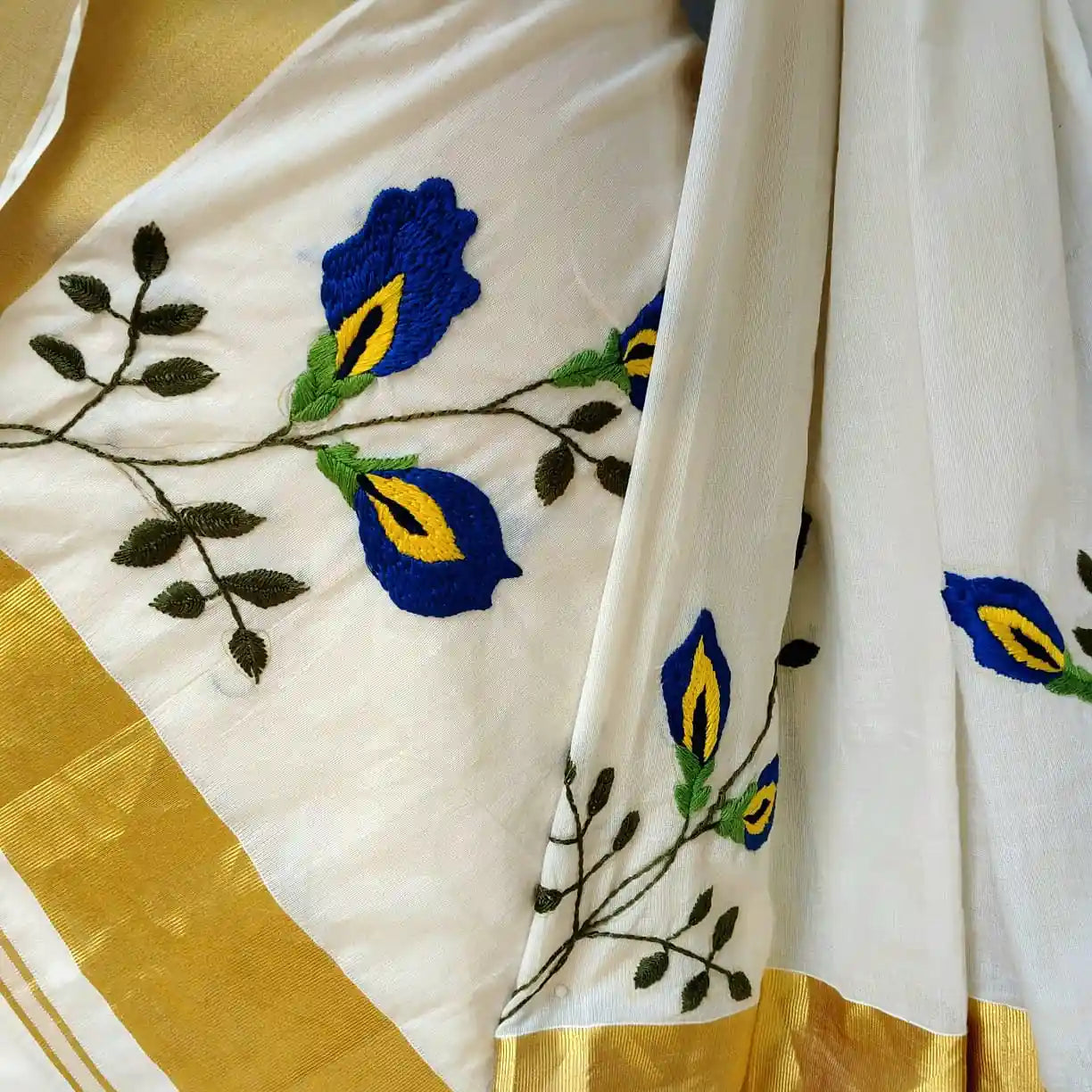 Kerala Set Mundu Adorned With Hand Embroidered Elegance