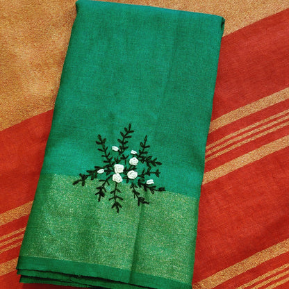 A linen Saree Graced With Hand-Embroidered Elegance