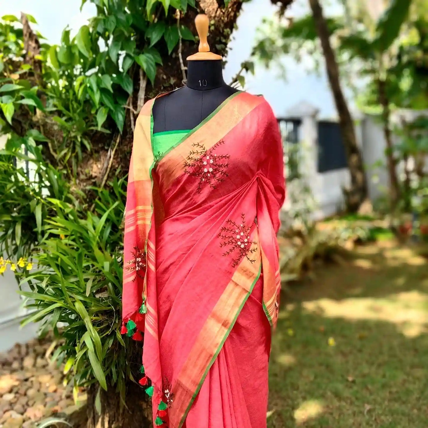 A linen Saree Graced With Hand-Embroidered Elegance