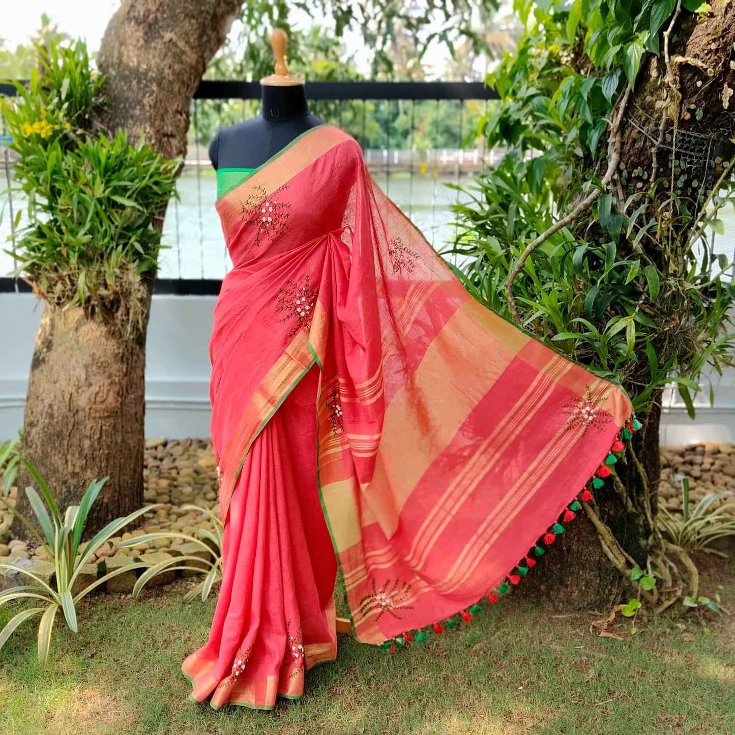 A linen Saree Graced With Hand-Embroidered Elegance