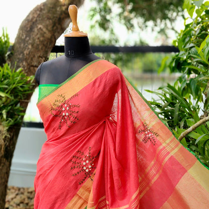 A linen Saree Graced With Hand-Embroidered Elegance