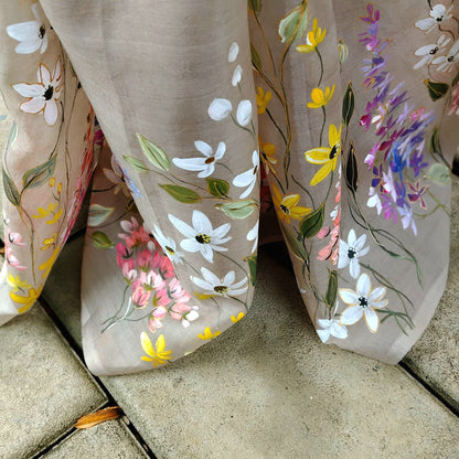 A Dreamy Pure Silk Organza Saree Adorned With Hand-Painted Wild Blooms