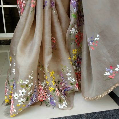A Dreamy Pure Silk Organza Saree Adorned With Hand-Painted Wild Blooms