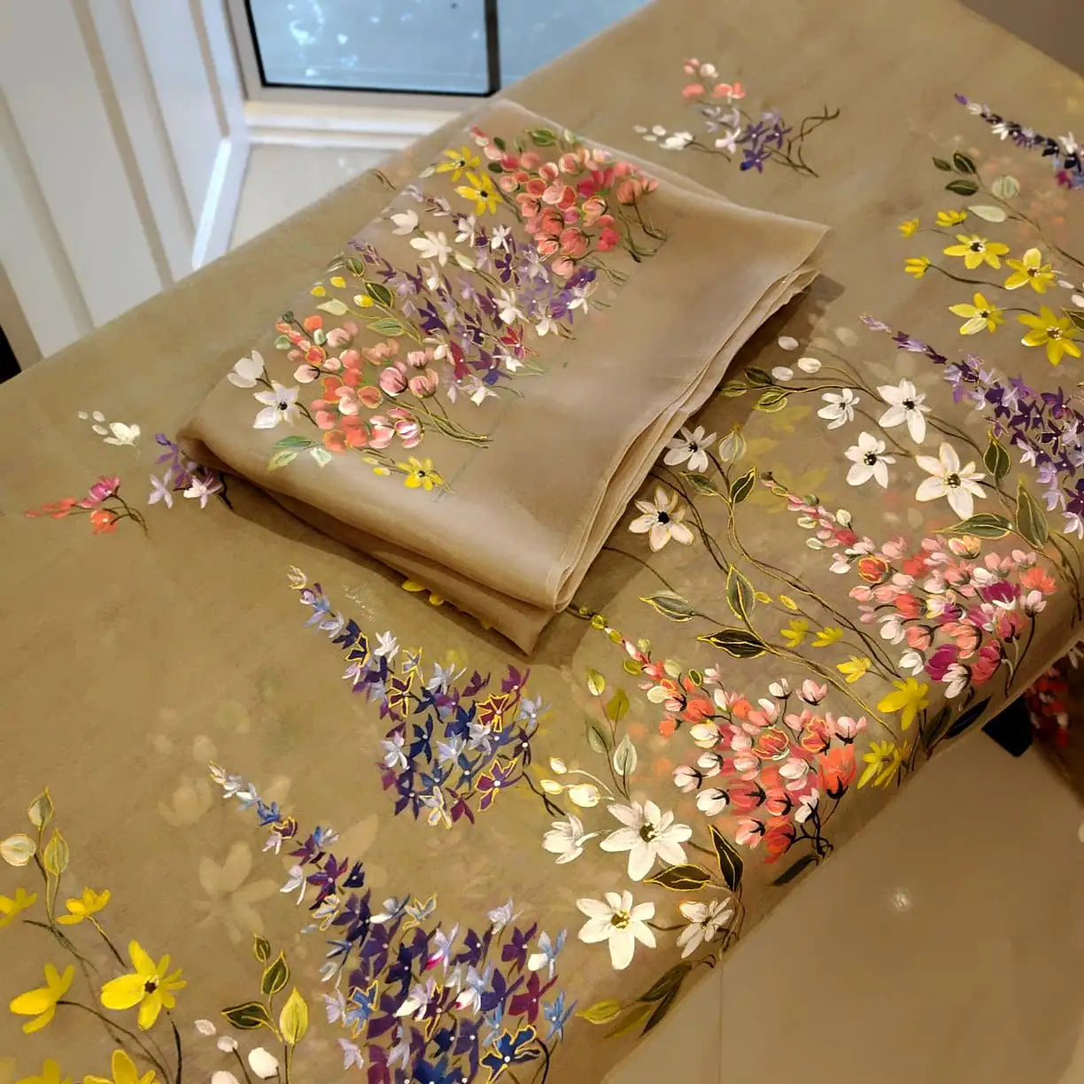 A Dreamy Pure Silk Organza Saree Adorned With Hand-Painted Wild Blooms