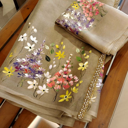 A Dreamy Pure Silk Organza Saree Adorned With Hand-Painted Wild Blooms