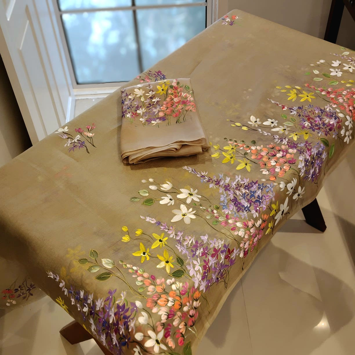 A Dreamy Pure Silk Organza Saree Adorned With Hand-Painted Wild Blooms