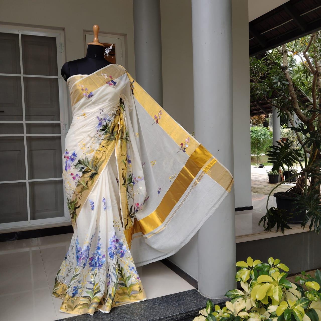 Unique Pure Handloom Kerala Kasavu Saree Hand-Painted With Delicate Wild Blossoms.