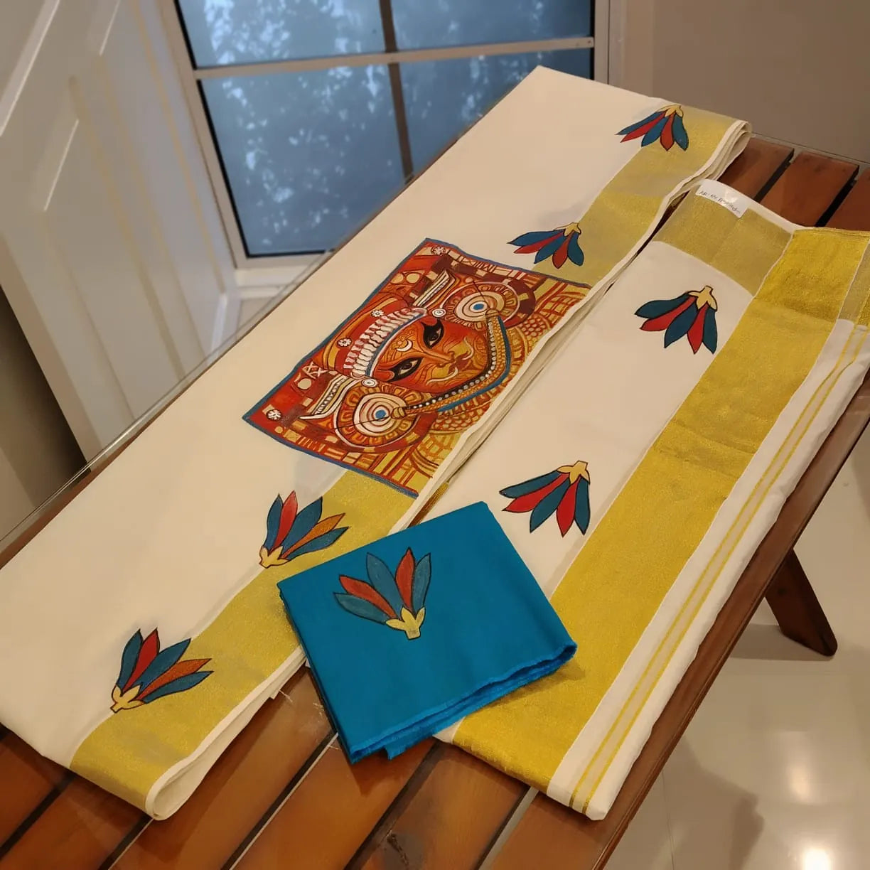 Exquisite Hand-Painted Theyyam Splendour