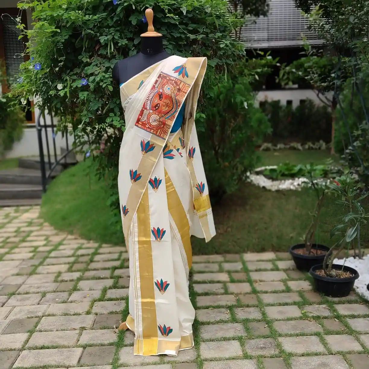 Exquisite Hand-Painted Theyyam Splendour