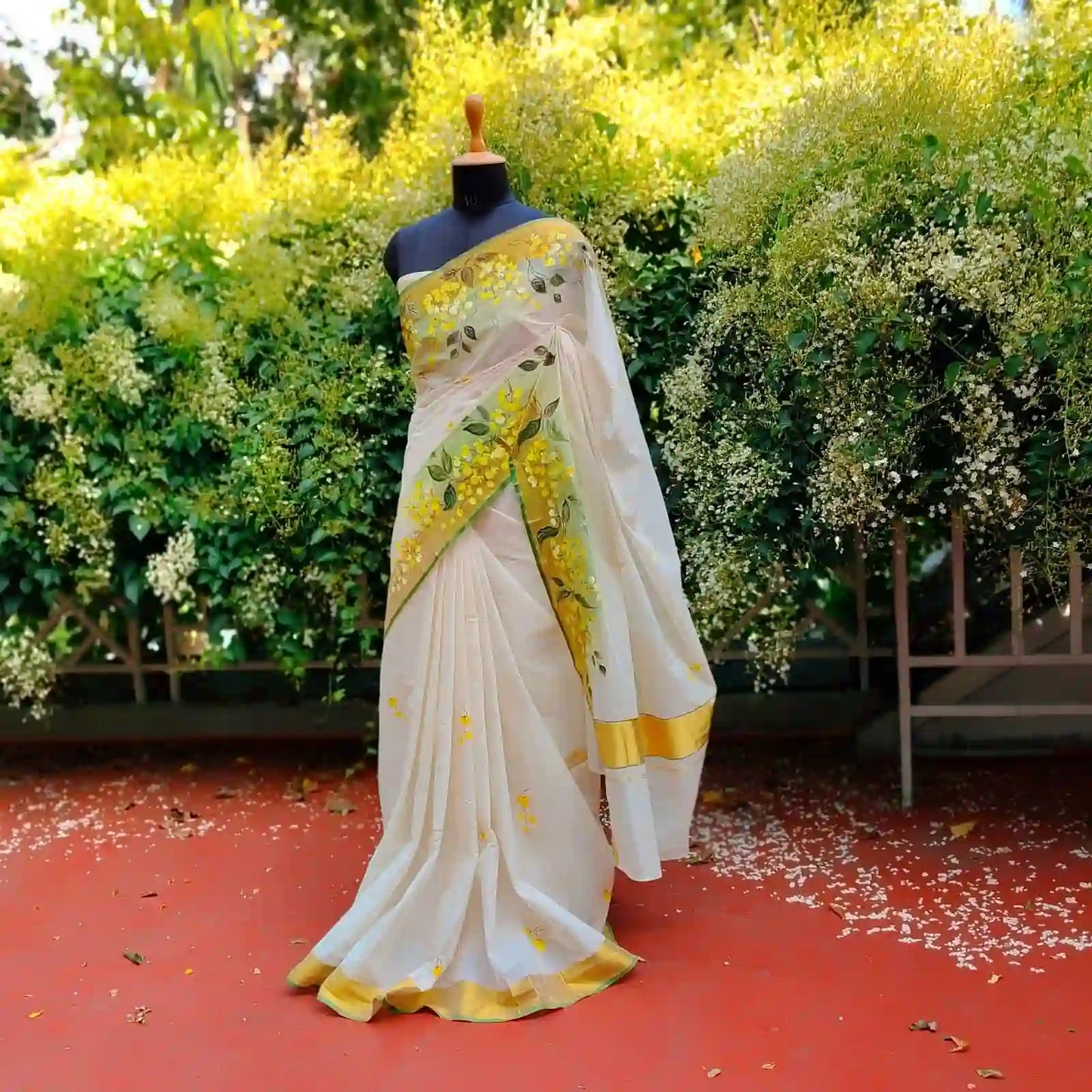 Kanikonna on Kasavu Saree – Hand-painted Elegance