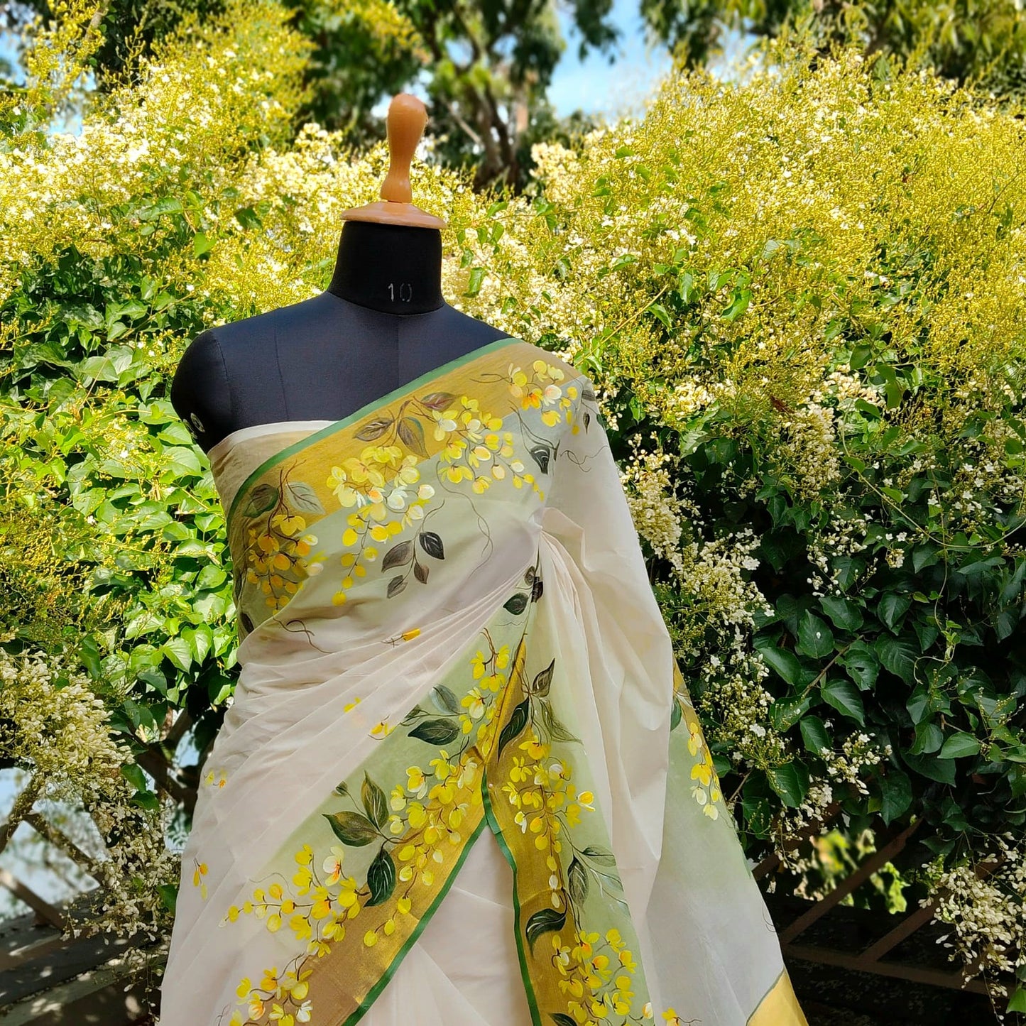 Kanikonna on Kasavu Saree – Hand-painted Elegance