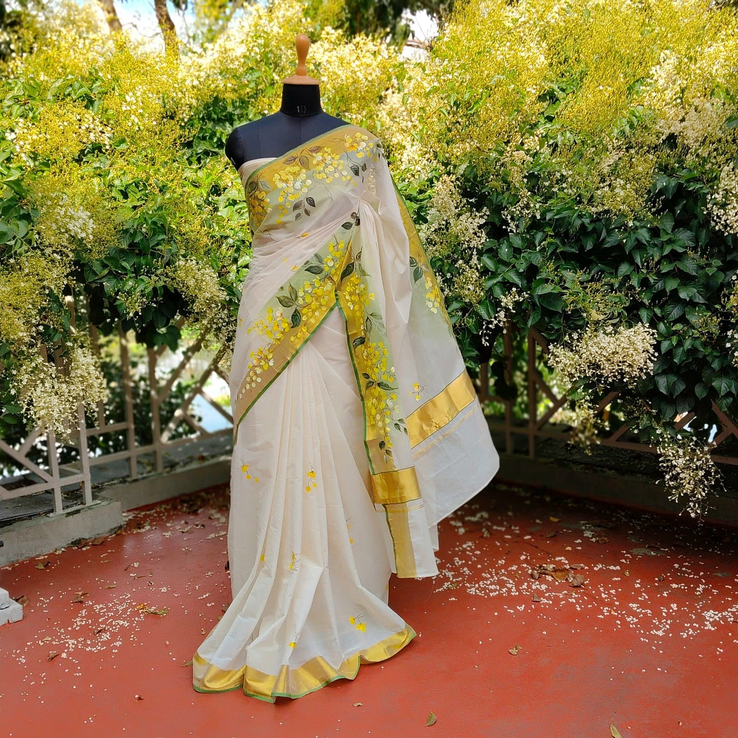 Kanikonna on Kasavu Saree – Hand-painted Elegance