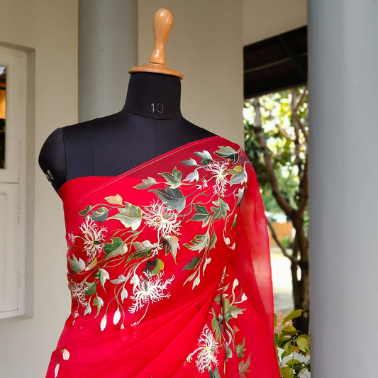 Hand-Painted Red Organza Saree With White Floral Elegance