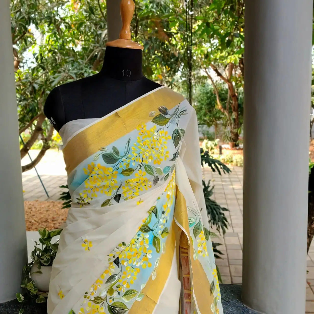 Kasavu Saree Featuring  Hand-Painted Boat Race Motif