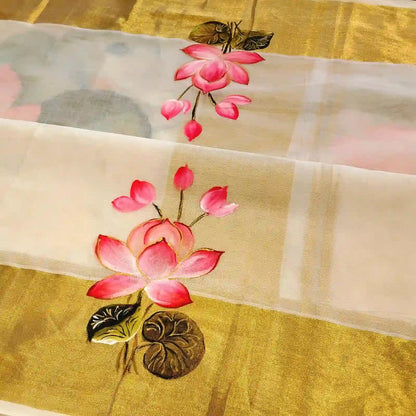 Where Tradition Meets Art – Hand-Painted Lotus On Handloom Kasavu Saree