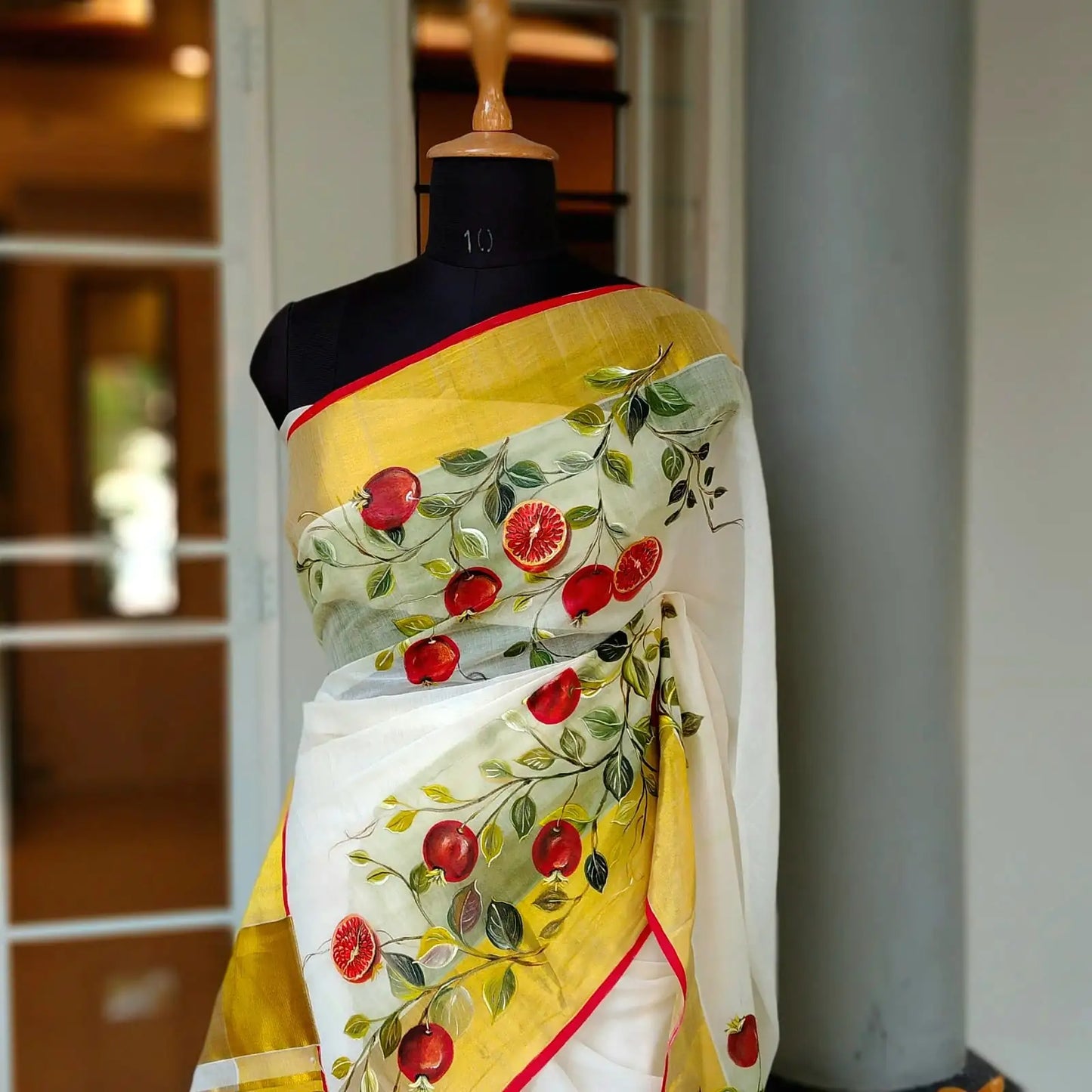 Kasavu Saree With Pomegranate Art