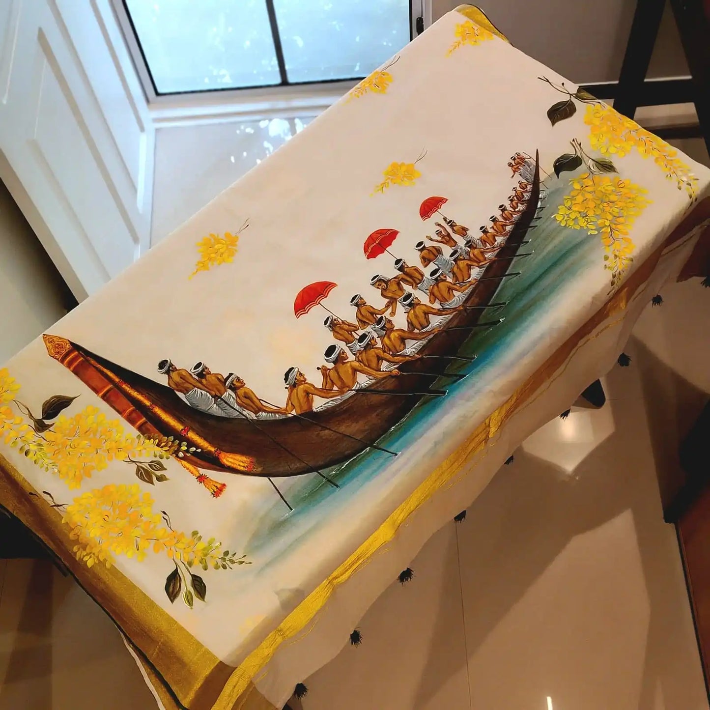 Kasavu Saree Featuring  Hand-Painted Boat Race Motif
