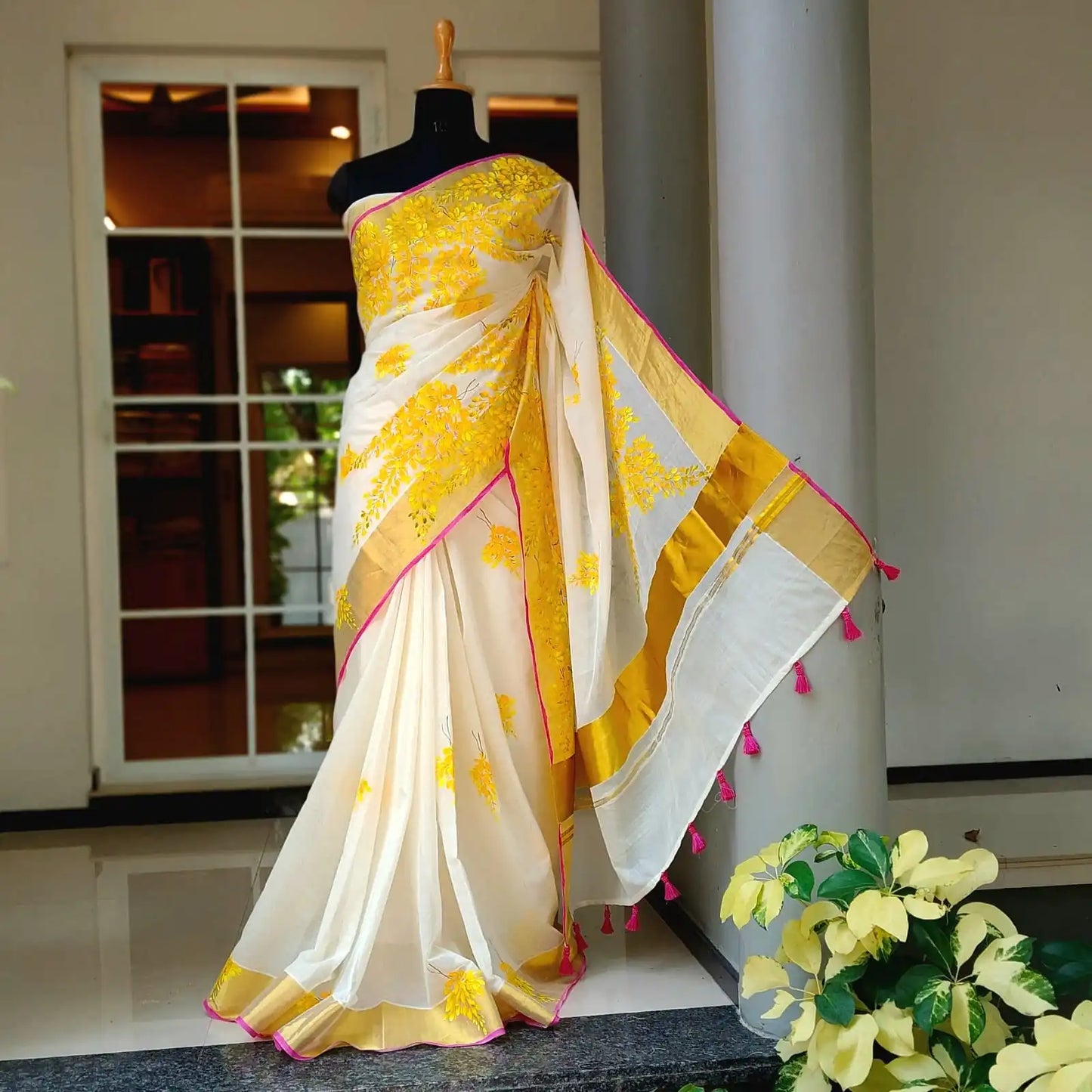 Graceful Kani Konna Florals on Kerala Kasavu -Subtle, Intricate, Timeless