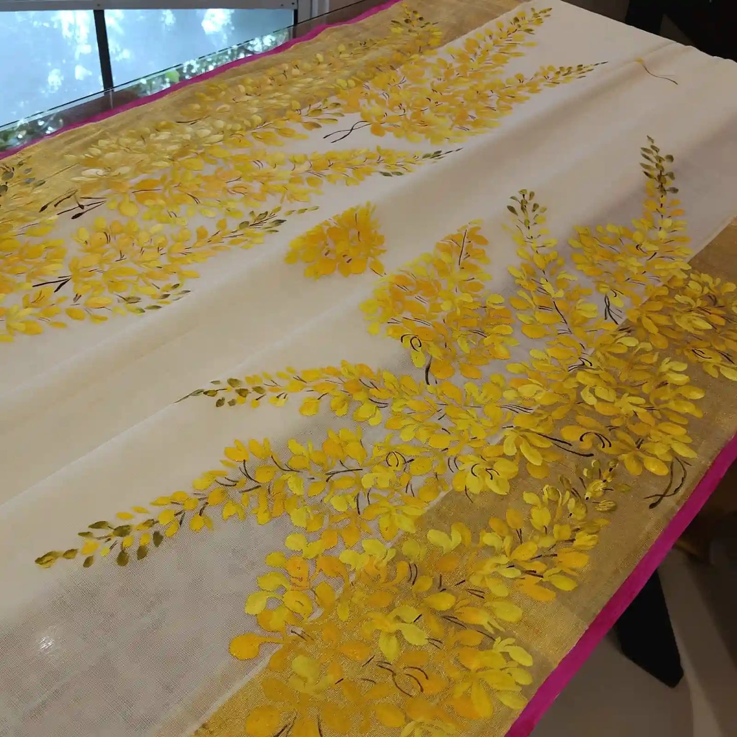 Graceful Kani Konna Florals on Kerala Kasavu -Subtle, Intricate, Timeless